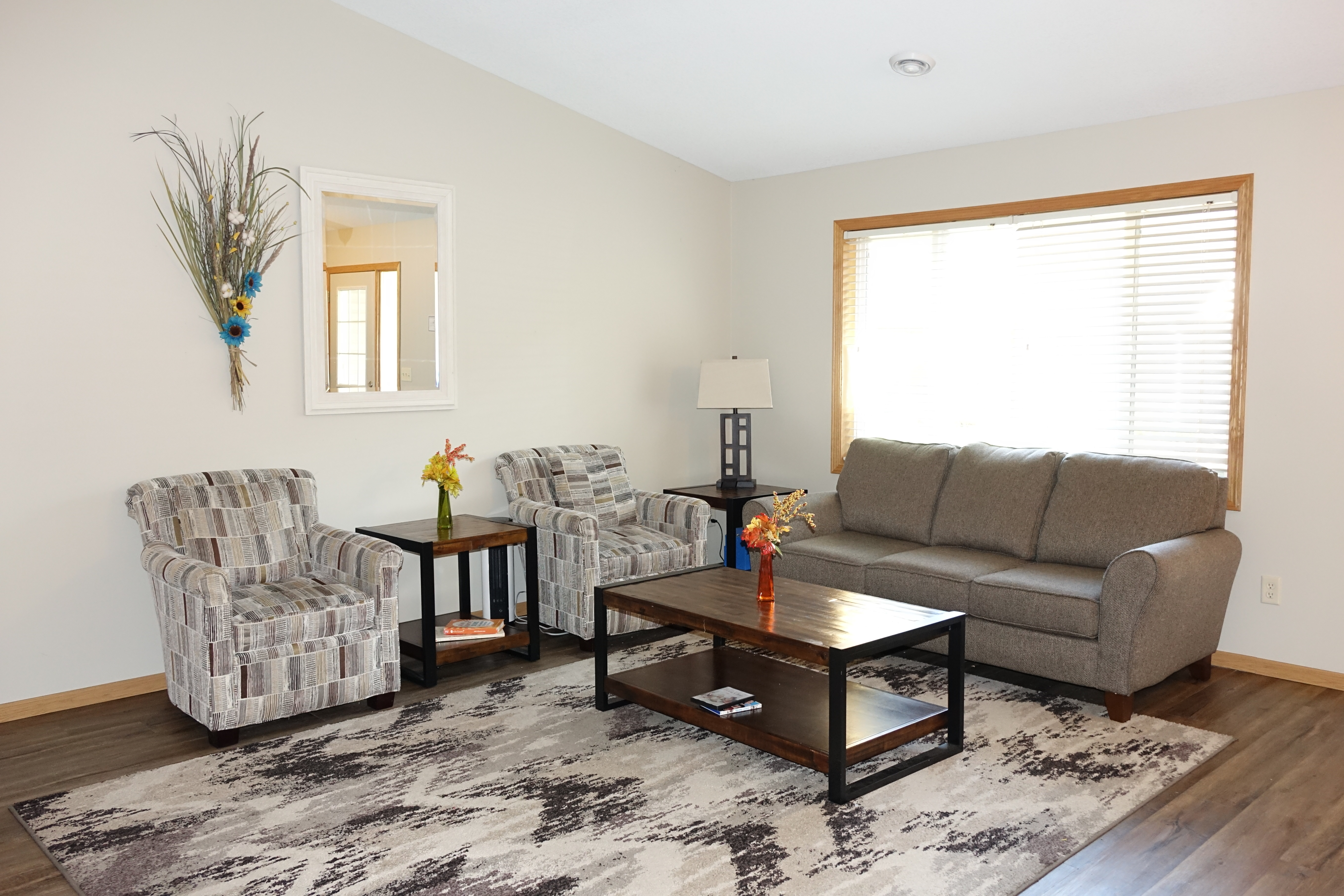 Living room with sofa and armchairs