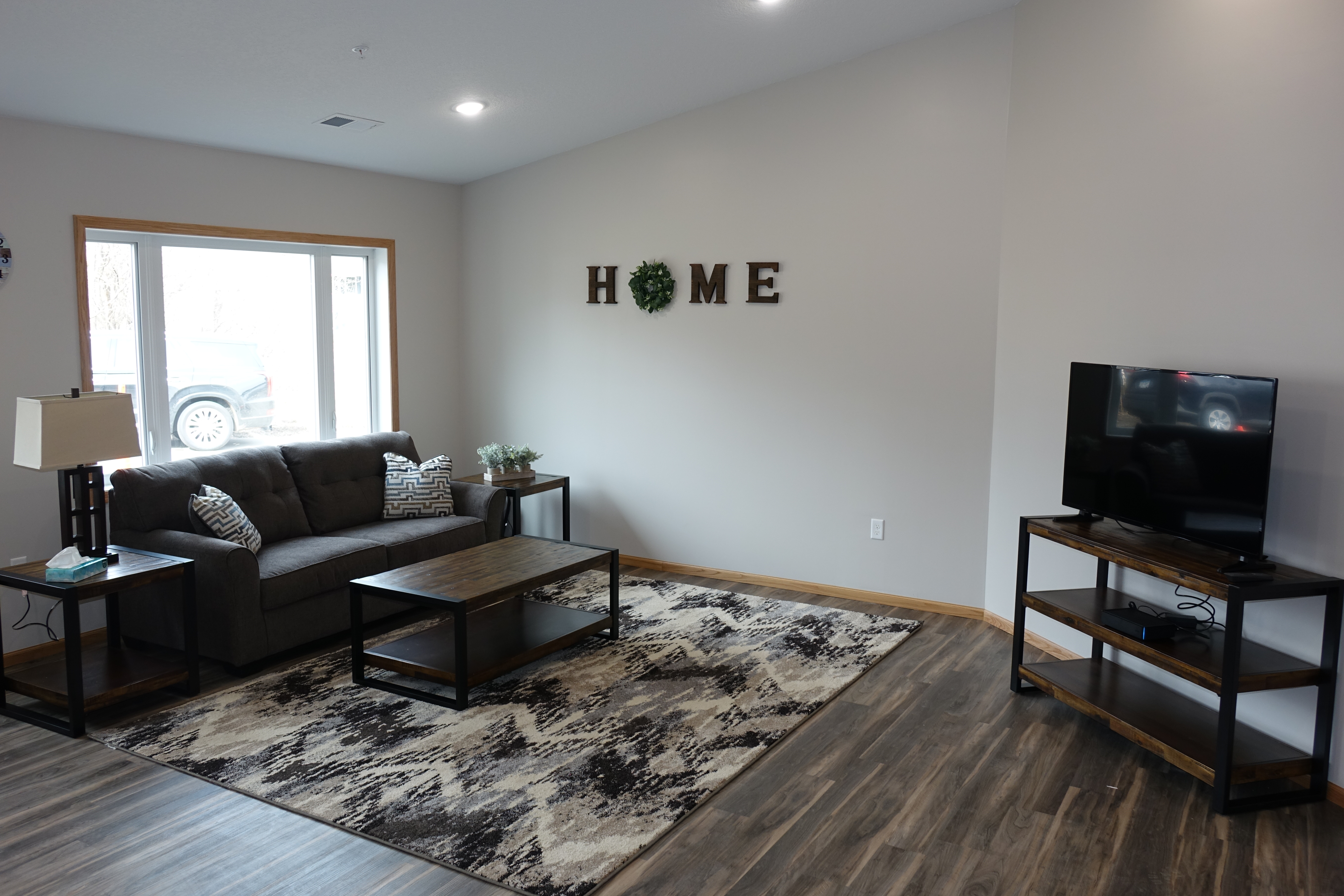 Second living lounge with television