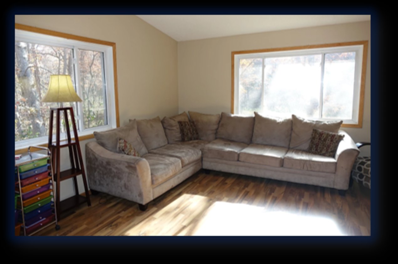 Bright sitting area with sectional sofa