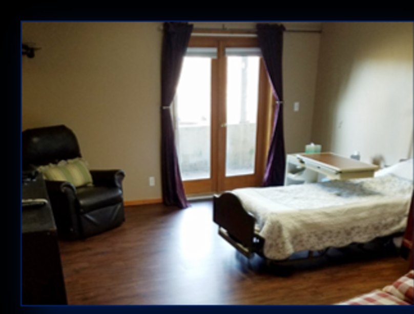 Resident bedroom with patio access